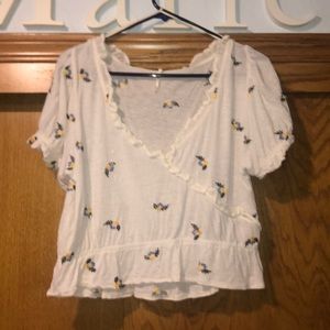 White crop top with embroidered flowers